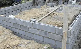 Professionals building a foundation with blocks in Tucson, AZ