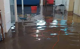 Basement with boiler, cabinets and washing machine completely flooded in Tucson, AZ