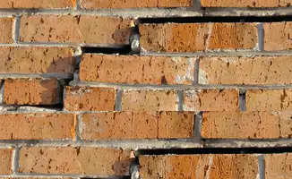 Brick wall with serious structural damage in Tucson, AZ